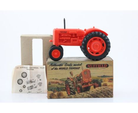 Boxed Nuffield Universal Four Model Tractor with assembly instruction and inner cardboard cover, produced by Raphael Lipkin L