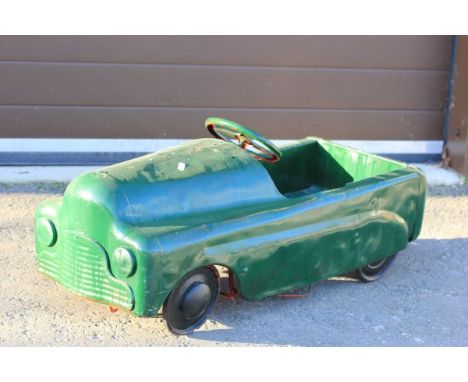 Vintage metal pedal car, in good condition other than re-painted green over the original red