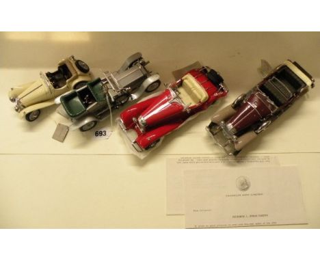 Three boxed 1:24 scale Franlkin Mint model vehicles including 1930 Duisenberg J, 1935 Mercedes 500J Special Roadster and 1938