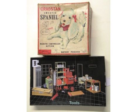 Boxed Fujimi Garage & Tools 1:24 model kit complete with instructions plus a boxed battery powered Cragstan Sweetie Spaniel