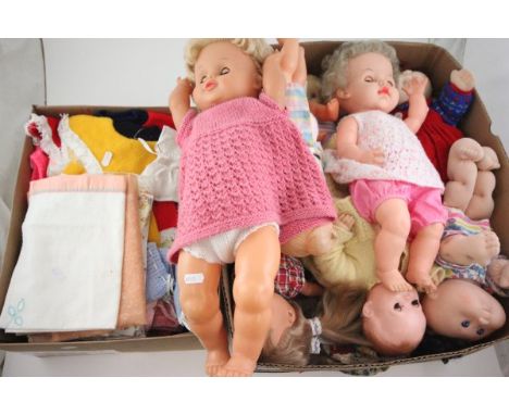 Quantity of various dolls including Cabbage Patch and clothing