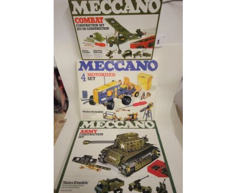 Three vintage boxed Meccano sets including 4 Motorised Set, Combat set and Army set all appearing complete/very near