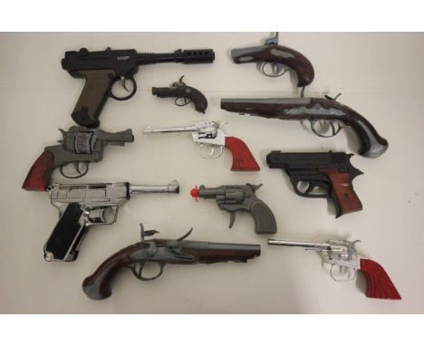 Collection of 12 vintage toy guns including Bandolero, Lone Star, 008 Secret Gun etc