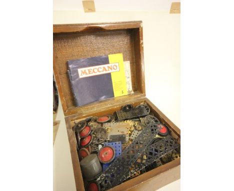 Brown box containing quantity of vintage Meccano in various colours, rusting