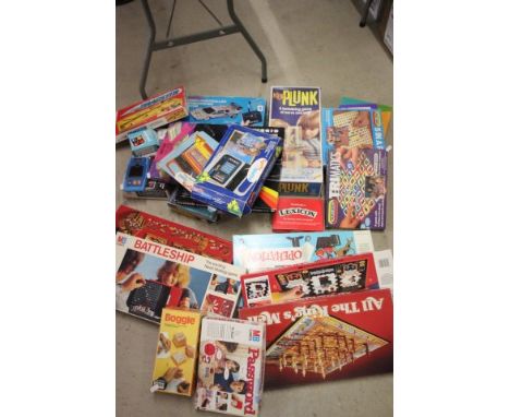 Quantity of vintage board games, battery operated car and computerised games including Ideal Ker Plunk, Buccaneer etc