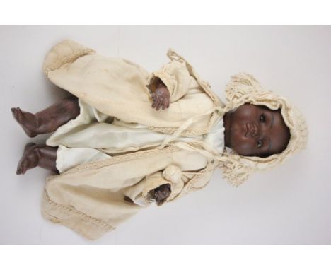 Theodor Recknagel Bisque Headed German Black Doll, impressed mark to neck NK2 A 6 R with fixed brown eyes, closed moth and co
