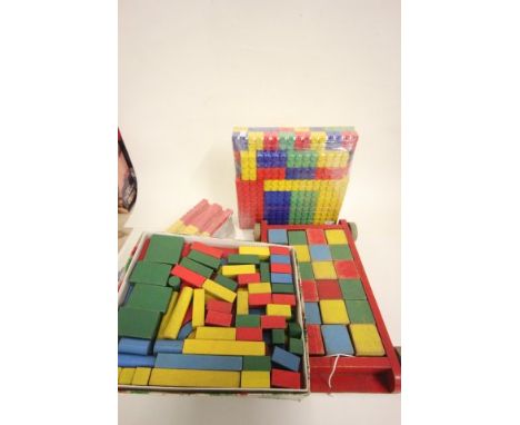 Three sets of vintage coloured building blocks including wood people, wood and one plastic plus pull along cart with building