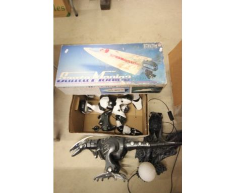 Boxed Kyosho Santa Monica radio control racing boat, gargoyle style lamp and two robotic toys