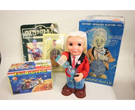 Three vintage tin plate toys including boxed ST Space Shuttle, boxed New Actions Blushing Willy and a Jouets en Fer-Blane Bal