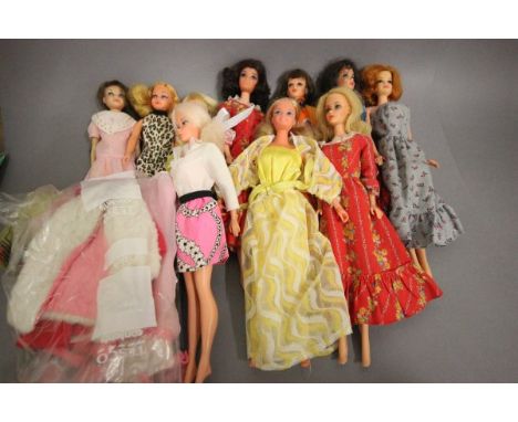 Three Vintage Loose Mattel Skipper Dolls and Seven Vintage Loose Mattel Barbie Dolls plus some clothing, shoes and other acce