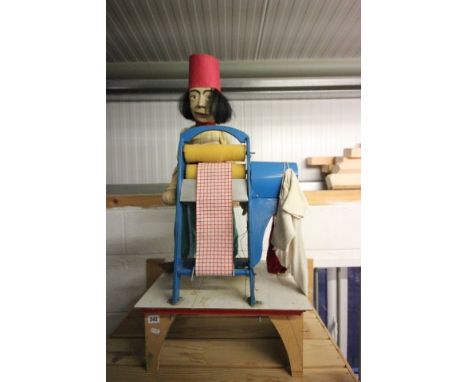 Vintage puppet and Marionette on mangle
