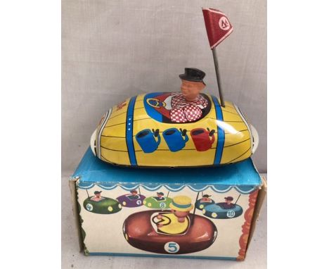 Tinplate: A vintage tinplate Bumper or Dodgem car made in Germany. Excellent condition with colourful litho showing Cola fron
