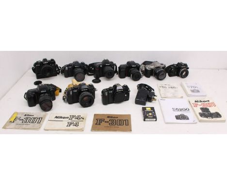 Nikon: A collection of eight assorted Nikon cameras to comprise: Nikon EM with Nikon Series E 50mm 1:1.8 lens; two Nikon F50 