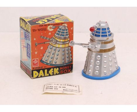 Codeg: A boxed Codeg, Dr. Who, Dalek Money Box, 1965. Original box, blue, silver and gold tinplate / plastic body with comple