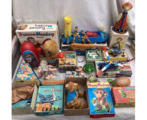 Tinplate: A vintage tinplate collection to include: Trainee Boxing Monkey, Crawling Baby, Walking Tortoise, Seal with ball, H