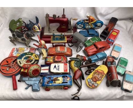 Tinplate: A collection of assorted vintage tinplate to include: a large selection of assorted toys, Casige Sewing Machine, BO