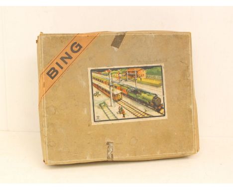 Bing: A boxed Bing, O Gauge, LMS 3743 0-4-0 locomotive and tender, with two coaches, track, key and instructions. Original bo