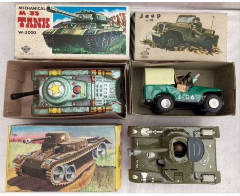 Tinplate: A collection of assorted vintage tinplate military vehicles to include Gama clockwork tank, excellent working condi