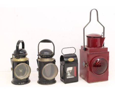 Railwayana: A collection of four railway lamps to comprise: a BR maroon, lacking manufacturer mark; a C. Polkey three aspect 