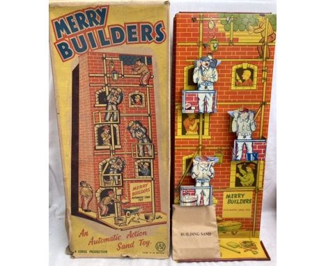 Tinplate: A vintage tinplate Merry Builders made in England by Codeg. An automatic action sand toy. Unused in original box. (