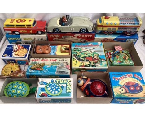 Tinplate: A vintage tinplate collection to include Vacational Express, Twinkling Bug, Happy Hippo Bank, etc. All boxed in goo