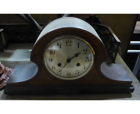 A 1920's Mantel Clock with steel dial and striking movement in inlaid mahogany domed case with inscription.  18" (46cms) wide