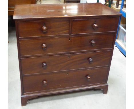 An early 19th century mahogany Chest of three long and two short Drawers with turned pull handles, and on bracket feet.  3' 5