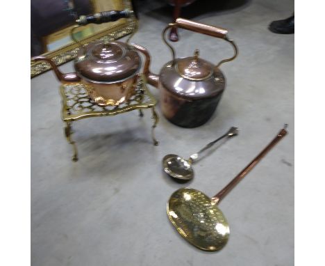 A quantity of Assorted Metalware including brass trivet, two copper kettles, a skimmer and a ladle. 