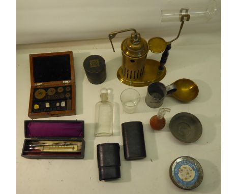 A number of Chemists Sundries including a box of weights, thermometer with ivory register, glass bottle in leather case etc. 