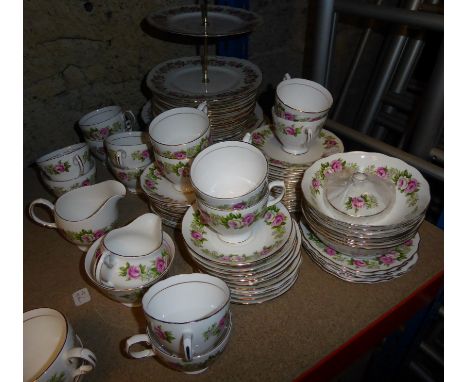 A Colclough floral decorated Table Service pattern No. 7132, comprising tea cups and saucers, plates in various sizes, etc., 