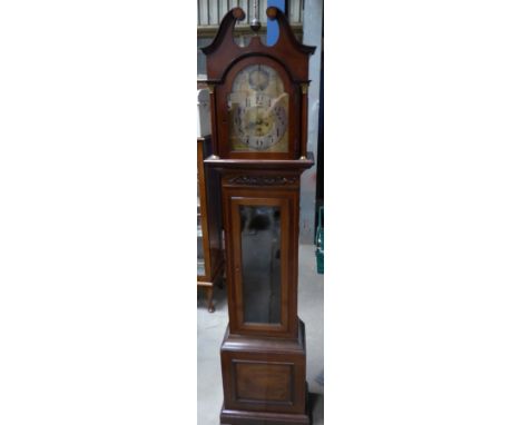 A Longcase Clock with steel and brass and dial in a mahogany case with swan's neck pediment and glazed door.  6' 6" (198cms) 