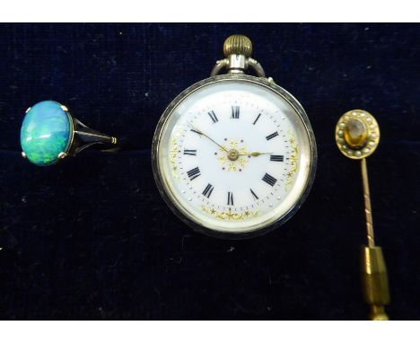 An open face Fob Watch with jewelled dial in engraved silver case, a gold Dress Ring set with an opal, and a Stick Pin.