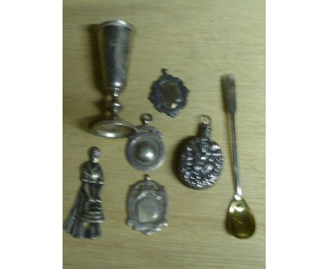 A small Russian engraved silver Cup, a small Continental oval Flask, three Fobs, etc.