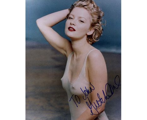 MOL GRETCHEN: (1972- ) American actress. Signed and inscribed colour 8 x 10 photograph of the former model standing in a half