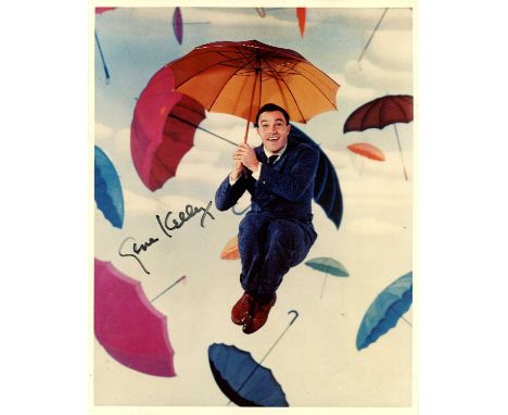 SINGIN’ IN THE RAIN: Gene Kelly (1912-1996) American dancer, actor and singer. Signed colour 8 x 10 photograph of Kelly ‘floa