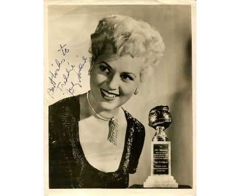 HOLLIDAY JUDY: (1921-1965) American actress, Academy Award winner. Vintage signed and inscribed 8 x 10 photograph of Holiday 