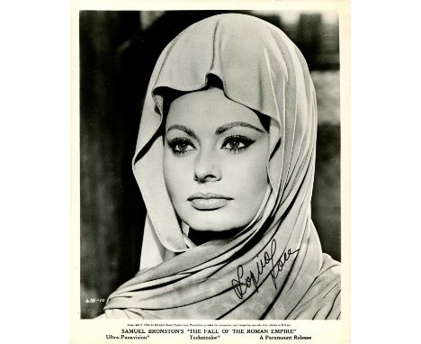 LOREN SOPHIA: (1934- ) Italian actress, Academy Award winner. Signed 8 x 10 photograph of the attractive actress in a head an