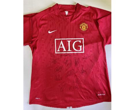 MANCHESTER UNITED F.C.: An official Nike red Manchester United short sleeve jersey featuring an embroidered team patch and sp