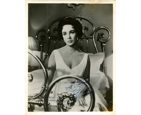 TAYLOR ELIZABETH: (1932-2011) British actress, Academy Award winner. A good vintage signed and inscribed 8 x 10 photograph of
