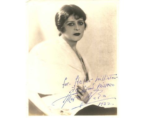 BARA THEDA: (1885-1955) American silent film actress. Vintage signed and inscribed sepia 8 x 10 photograph of Bara seated in 