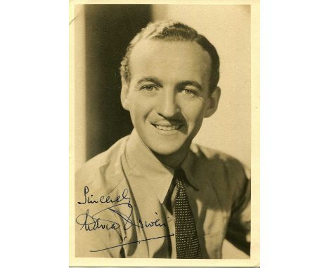 NIVEN DAVID: (1910-1983) English actor, Academy Award winner. A good vintage signed sepia 5 x 7 photograph of the debonair Ni