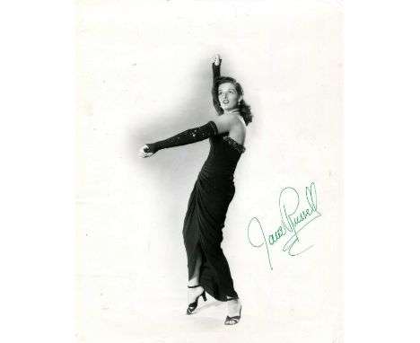 RUSSELL JANE: (1921-2011) American actress and sex symbol. A good vintage signed 8 x 10 photograph of Russell wearing an eleg