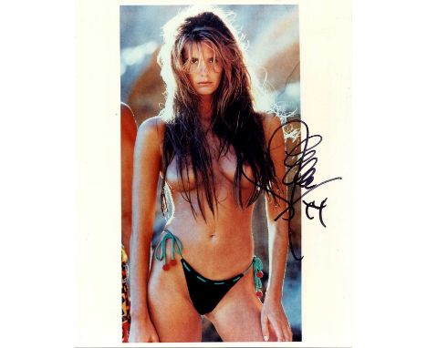 MACPHERSON ELLE: (1964- ) Australian model. Signed colour 8 x 10 photograph of Macpherson standing in a three-quarter length 