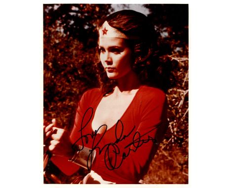 CARTER LYNDA: (1951- ) American actress. Signed colour 8 x 10 photograph of Carter standing outdoors in a half-length pose in