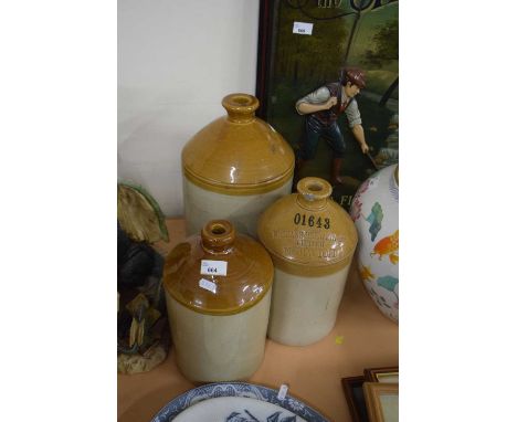 Three ceramic flagons, one marked for Morgans Brewery, Norwich