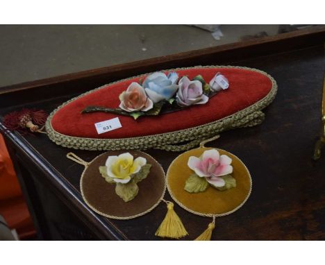 Wall plaque with ceramic roses and two others smaller