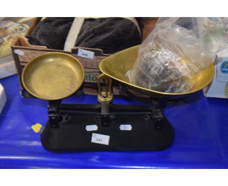 A pair of scales with selection of weights