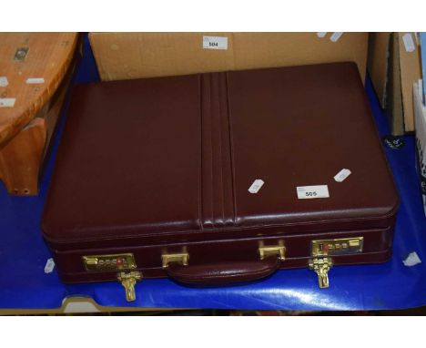 A plum coloured briefcase