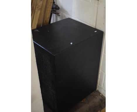 A large speaker in black cabinet