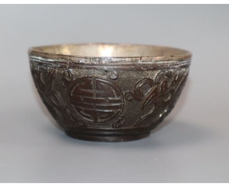 A Chinese silver lined coconut bowl, 18th / 19th century